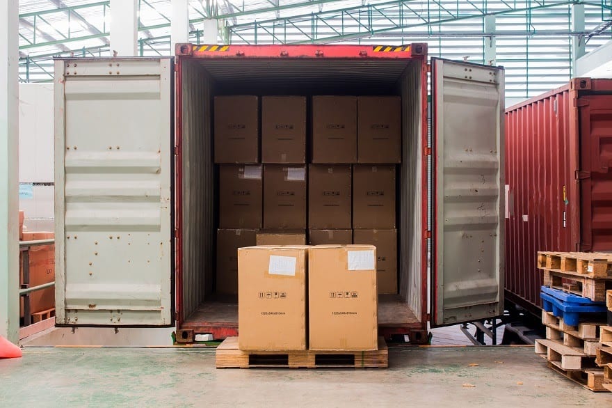 Boxes of contents being unloaded by a international moving company in Dubai