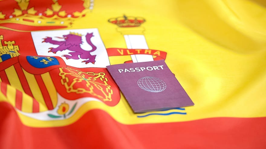 Moving to Spain - Flag and passport.